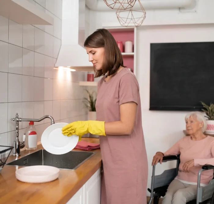 Nurse Giving Domestic Support to an aged disable women